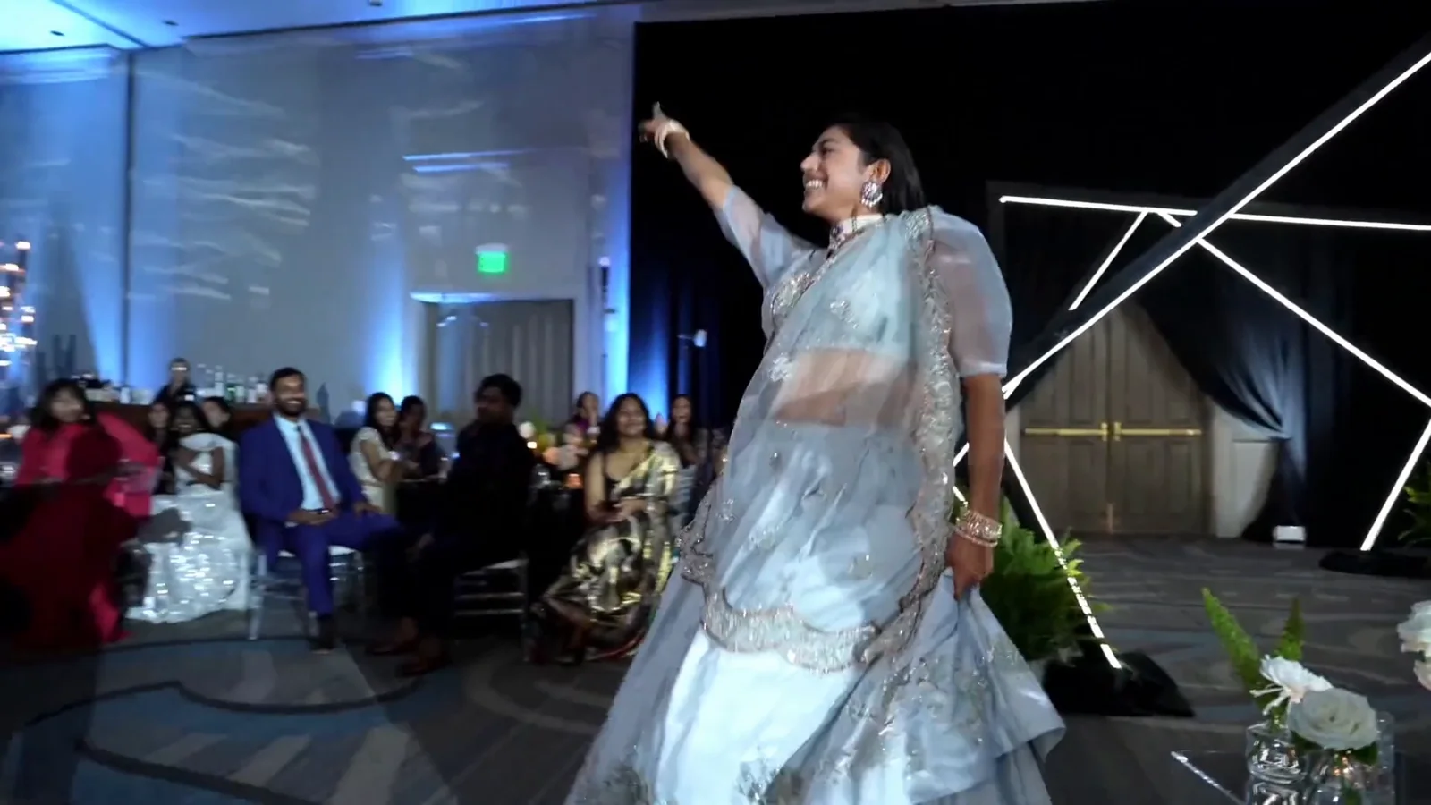Bride and family dance together at the Sangeet