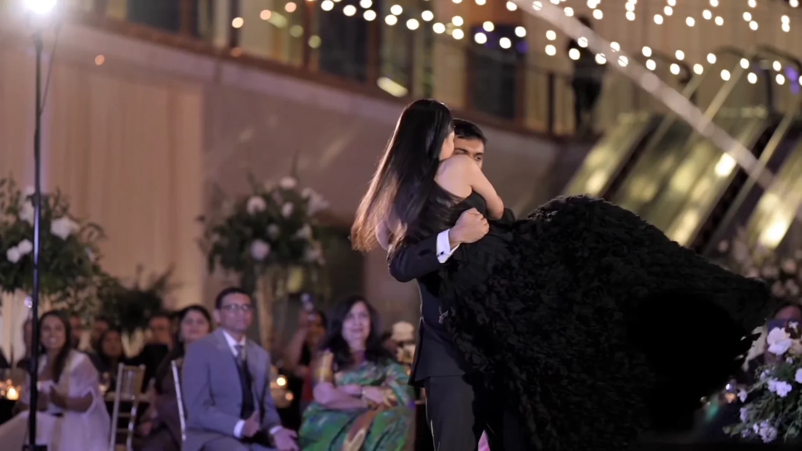 Couple dancing together during their wedding celebration